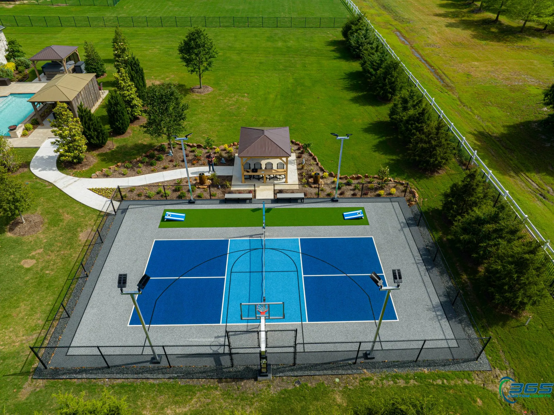 365 Custom Courts aerial view of backyard basketball court in Dallas