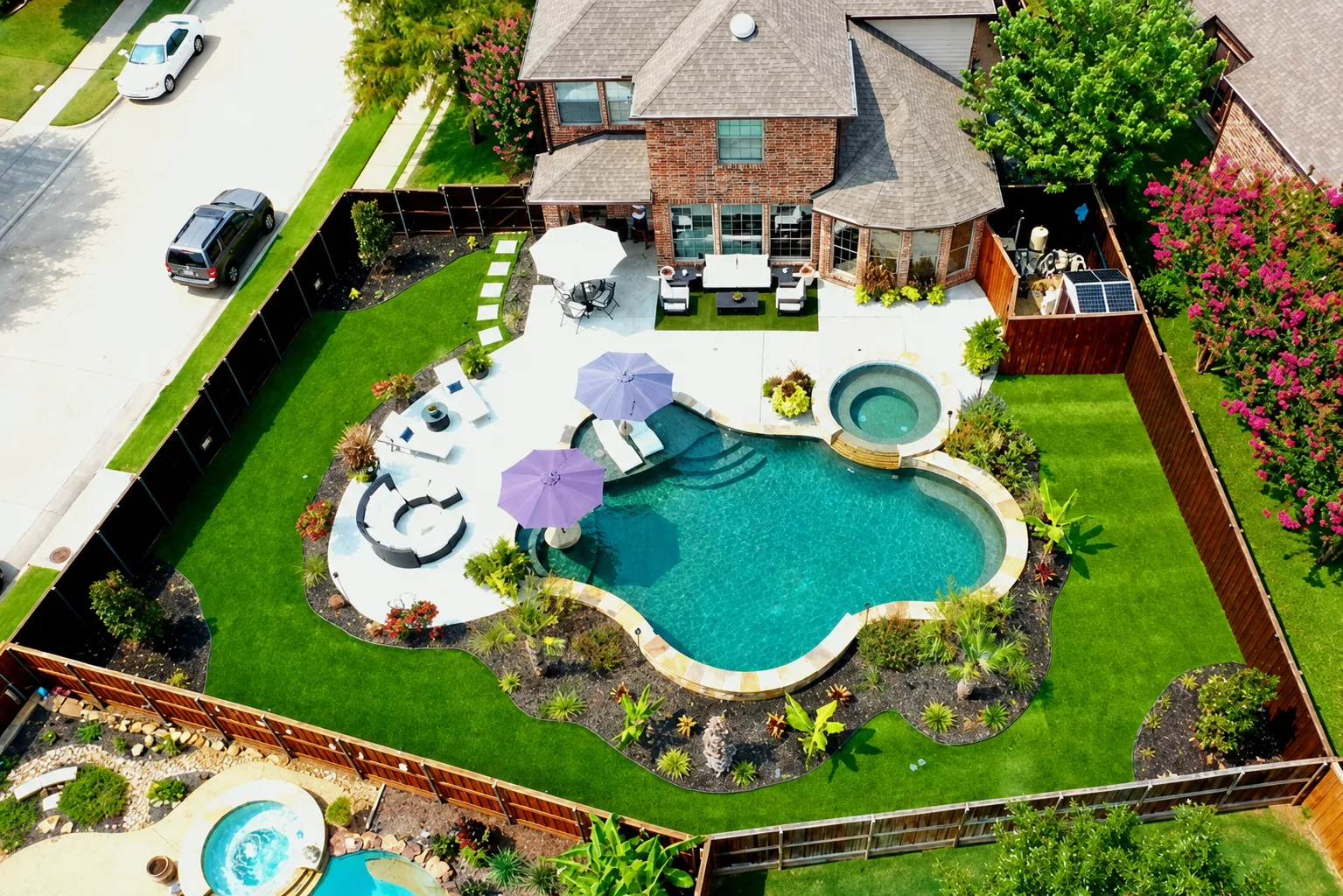 Residential turf with stone borders and outdoor living