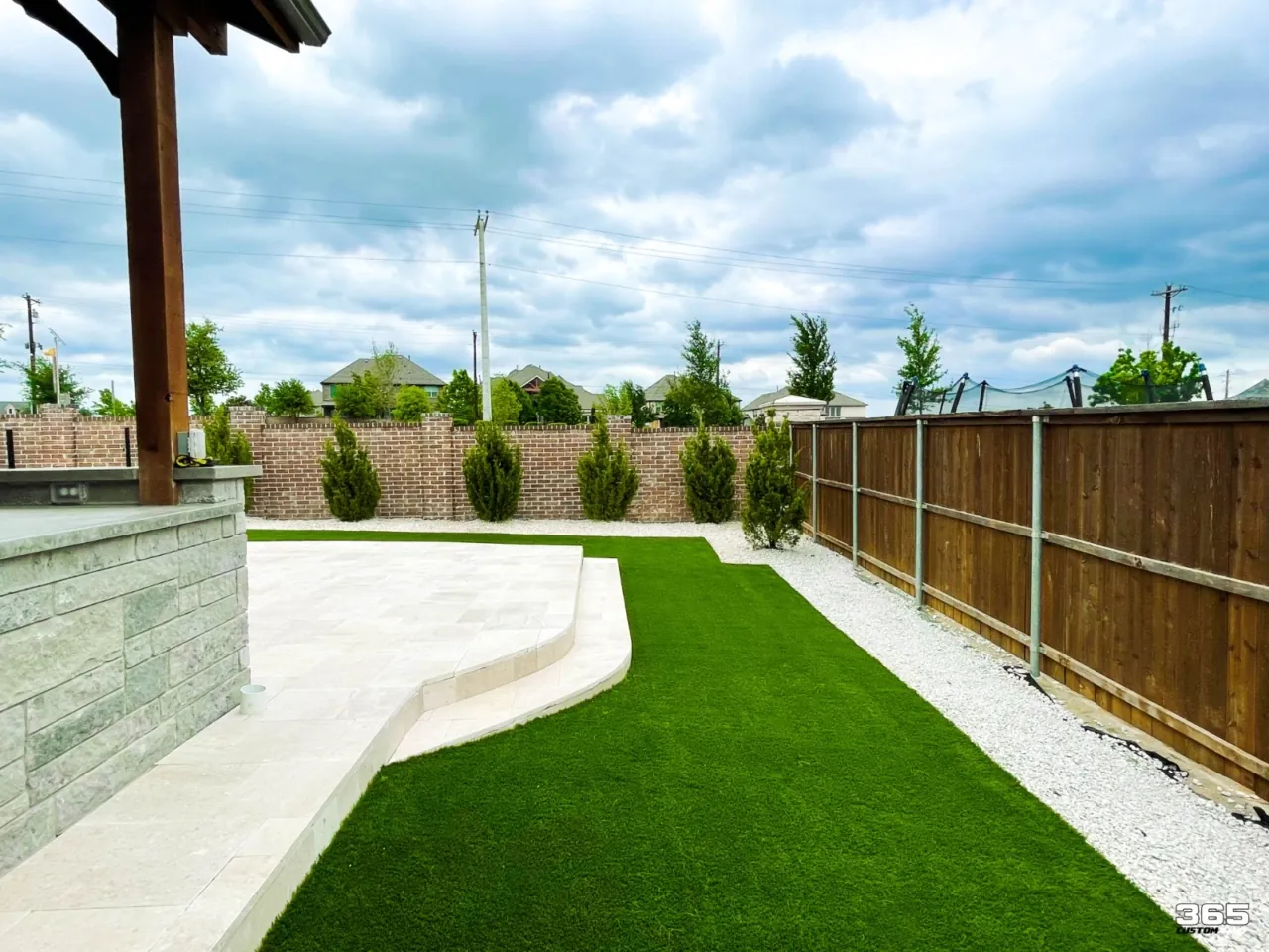Turf installation with clean edges and landscaping