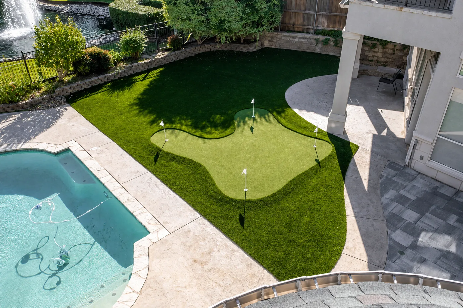 Residential backyard with turf and modern design