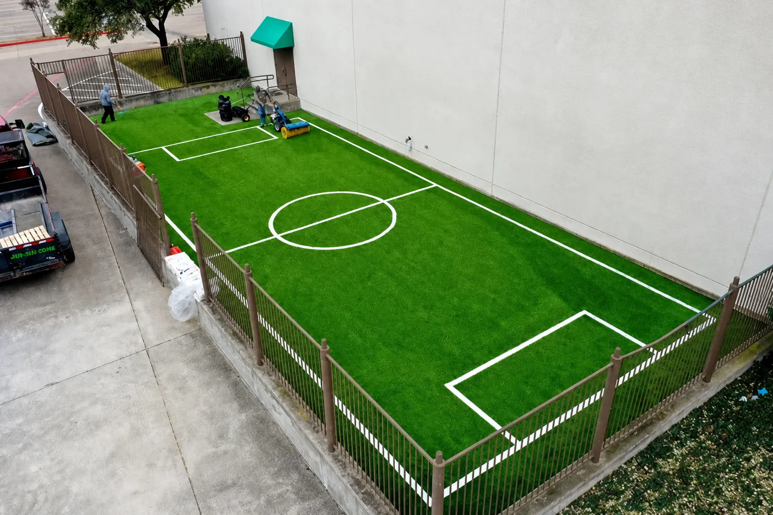 Commercial mini soccer field with iron fencing