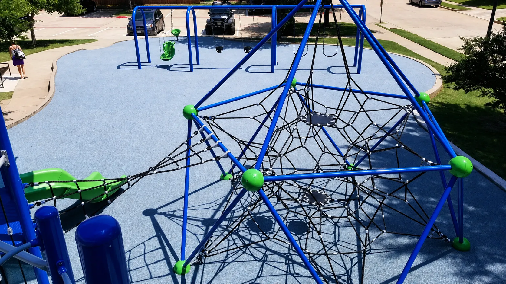 Playground climbing structure with rubber surfacing