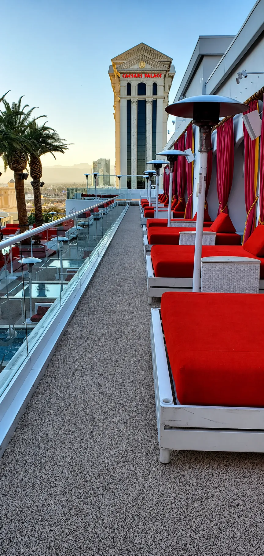 Drais Beachclub VIP cabanas with rubber surfacing and Caesars Palace tower