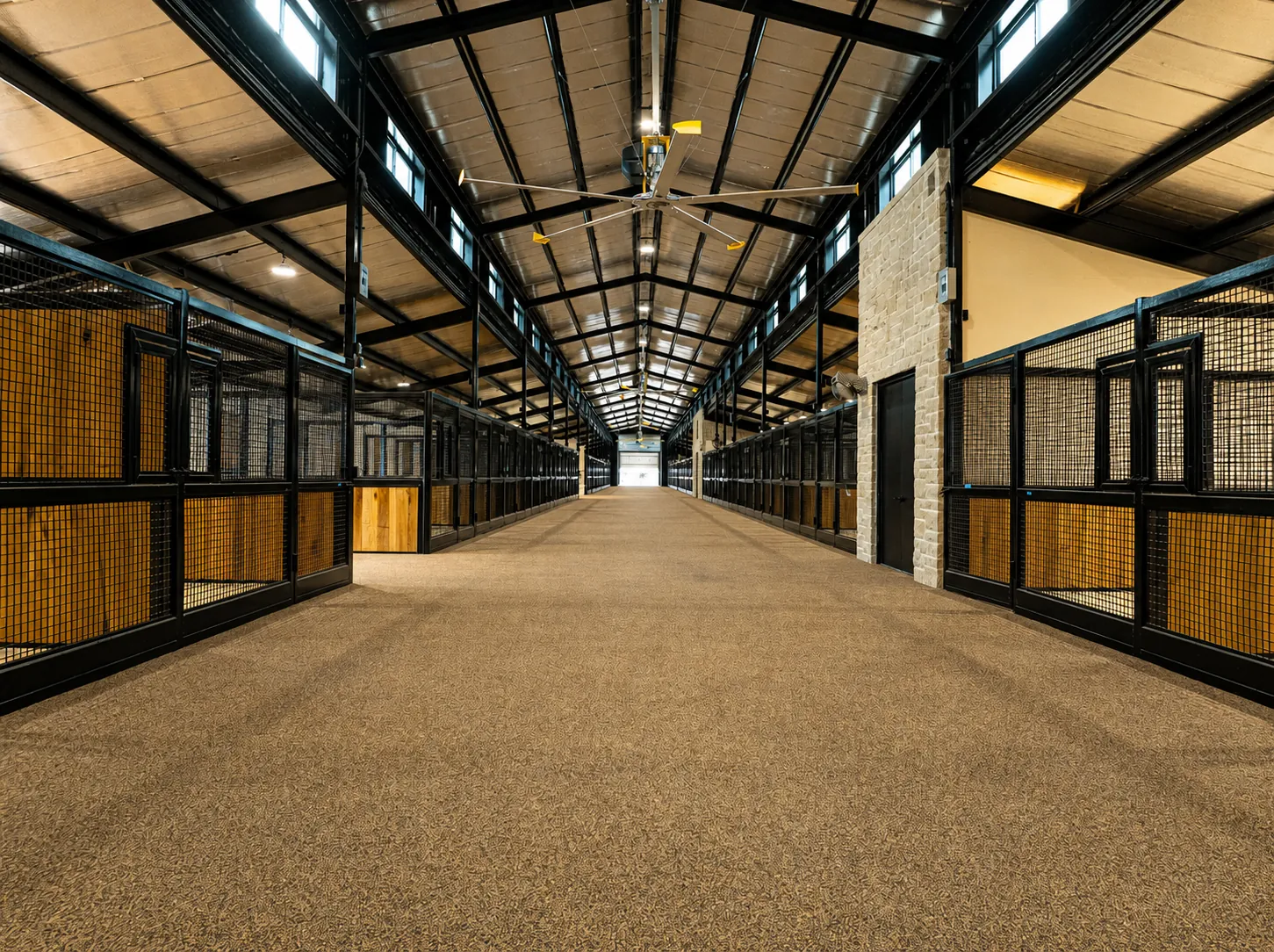 Horse ranch aerial view with barn and paddocks